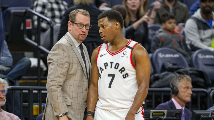 Jan 18, 2020; Minneapolis, Minnesota, USA; Toronto Raptors head coach Nick Nurse talks with guard Kyle Lowry (7) during a free throw in the second half against the Minnesota Timberwolves at Target Center. Mandatory Credit: Jesse Johnson-USA TODAY Sports