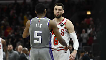 Mar 15, 2023; Chicago, Illinois, USA; Sacramento Kings guard De'Aaron Fox (5) and Chicago Bulls guard Zach LaVine (8) talk after the game
