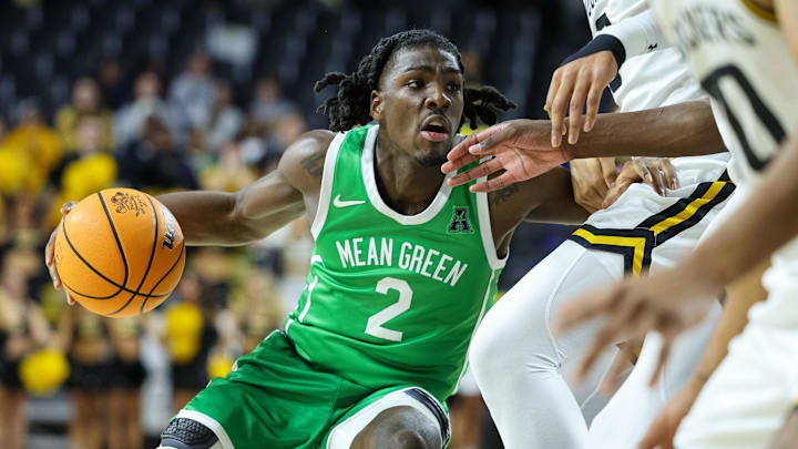 North Texas guard Johnathan Massie drives to the basket.