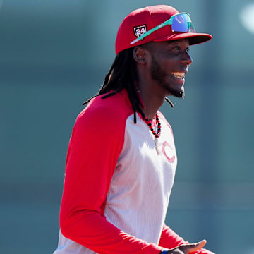 Feb 20, 2024; Goodyear, AZ, USA; Cincinnati Reds third baseman Elly De La Cruz (44) smile during fielding drills during spring training workouts at Goodyear Ballpark. Mandatory Credit: Kareem Elgazzar-Imagn Images