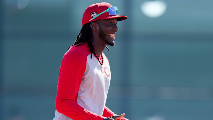 Feb 20, 2024; Goodyear, AZ, USA; Cincinnati Reds third baseman Elly De La Cruz (44) smile during fielding drills during spring training workouts at Goodyear Ballpark. Mandatory Credit: Kareem Elgazzar-Imagn Images