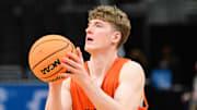 Mar 20, 2025; Milwaukee, WI, USA; Illinois Fighting Illini guard Kasparas Jakucionis (32) shoots the ball during NCAA Tournament First Round Practice at Fiserv Forum. Mandatory Credit: Benny Sieu-Imagn Images