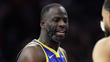 Mar 1, 2025; Philadelphia, Pennsylvania, USA; Golden State Warriors forward Draymond Green (23) shakes hands with guard Stephen Curry (30) during the first quarter against the Philadelphia 76ers at Wells Fargo Center. Mandatory Credit: Bill Streicher-Imagn Images
