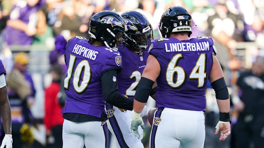 Tyler Linderbaum and DeAndre Hopkins.