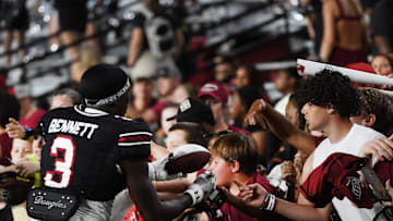 South Carolina football true freshman Mazeo Bennett signing autographs after the Garnet and Black Spring Game this April