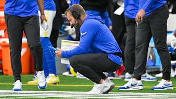 Oct 6, 2024; Inglewood, California, USA; Los Angeles Rams head coach Sean McVay looks over plays. Mandatory Credit: Robert Hanashiro-Imagn Images