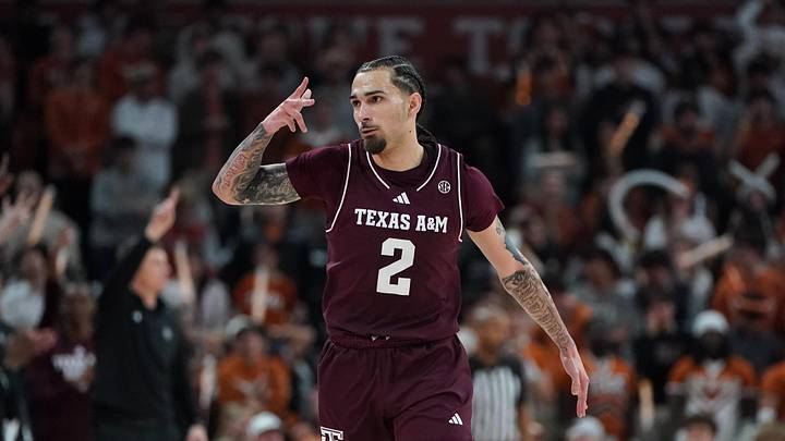 Jan 17, 2026; Austin, Texas, USA; Texas A&M Aggies guard Pop Isaacs (2) reacts to a three point basket against the Texas Longhorns during the second half at Moody Center. Mandatory Credit: Dustin Safranek-Imagn Images