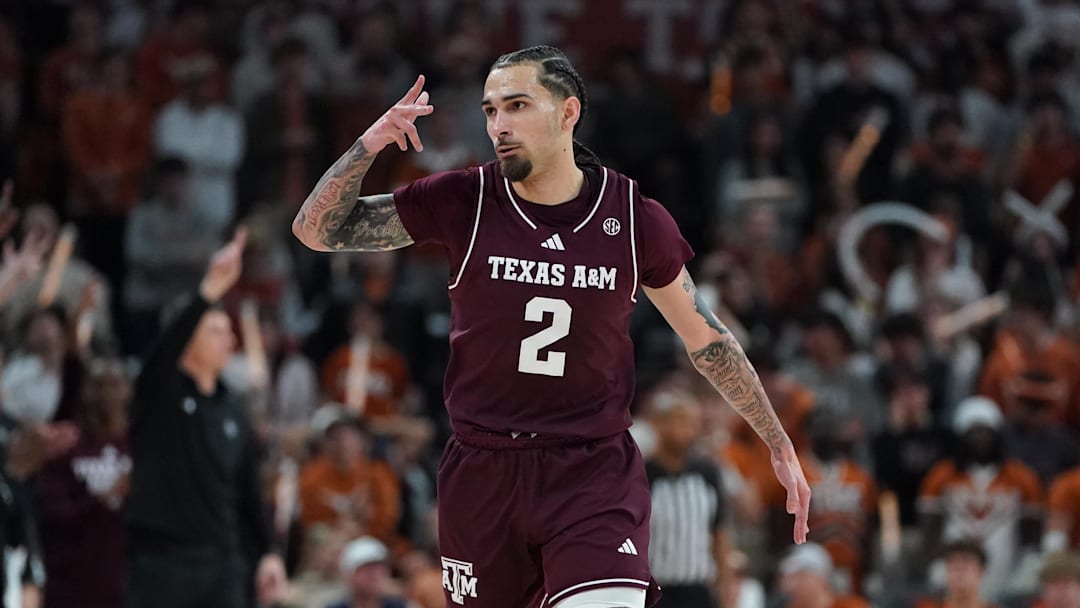 Texas A&M Aggies guard Pop Isaacs reacts to a three point basket against the Texas Longhorns during the second half at Moody Center. 