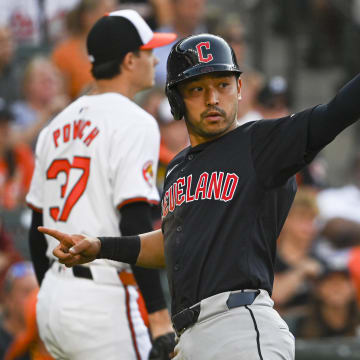 Jun 24, 2024; Baltimore, Maryland, USA;  Cleveland Guardians outfielder Steven Kwan (38) reacts after scoring on third base José Ramírez (not pictured) first inning single against the Baltimore Orioles  at Oriole Park at Camden Yards. Mandatory Credit: Tommy Gilligan-USA TODAY Sports