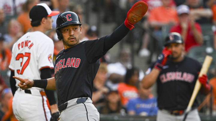 Jun 24, 2024; Baltimore, Maryland, USA;  Cleveland Guardians outfielder Steven Kwan (38) reacts after scoring on third base José Ramírez (not pictured) first inning single against the Baltimore Orioles  at Oriole Park at Camden Yards. Mandatory Credit: Tommy Gilligan-USA TODAY Sports