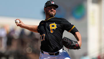 Mar 7, 2025; Bradenton, Florida, USA; Pittsburgh Pirates pitcher Tanner Rainey (27) throws a pitch against the Philadelphia Phillies in the sixth inning during spring training at LECOM Park. Mandatory Credit: Nathan Ray Seebeck-Imagn Images