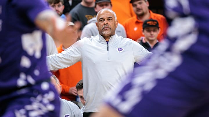 Jan 17, 2026; Stillwater, Oklahoma, USA; Kansas State Wildcats coach Jerome Tang watches game play during the first half against the Oklahoma State Cowboys at Gallagher-Iba Arena. 
