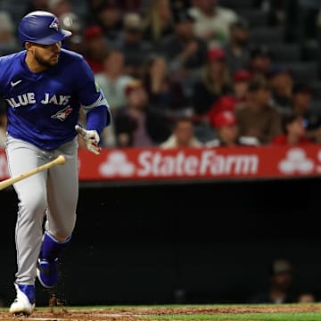 Anaheim, California, USA; Toronto Blue Jays designated hitter Anthony Santander (25) hits an RBI single during the sixth inning against the Los Angeles Angels at Angel Stadium.
