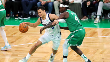 Jun 17, 2024; Boston, Massachusetts, USA; Dallas Mavericks guard Josh Green (8) drives to the basket against Boston Celtics guard Jrue Holiday (4) in game five of the 2024 NBA Finals at TD Garden. Mandatory Credit: Peter Casey-USA TODAY Sports