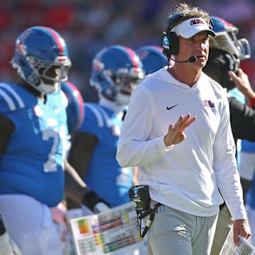 Sep 27, 2025; Oxford, Mississippi, USA; Mississippi Rebels head coach Lane Kiffin looks on during a time out during the second quarter against the LSU Tigers at Vaught-Hemingway Stadium. Mandatory Credit: Petre Thomas-Imagn Images