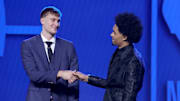 Jun 25, 2025; Brooklyn, NY, USA; Cooper Flagg and Dylan Harper shake hands on stage before the 2025 NBA Draft at Barclays Center. Mandatory Credit: Brad Penner-Imagn Images