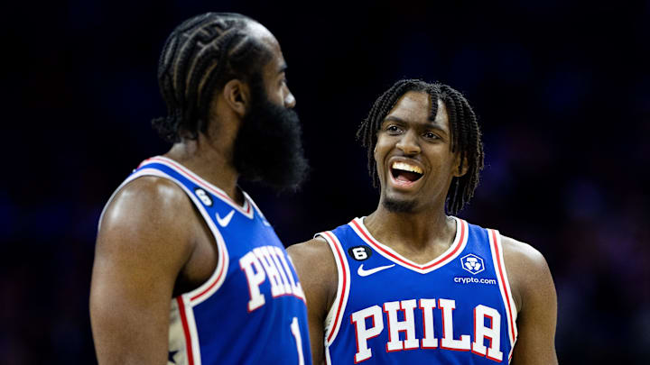 Mar 29, 2023; Philadelphia, Pennsylvania, USA; Philadelphia 76ers guard Tyrese Maxey (0) talks with guard James Harden (1) during the fourth quarter against the Dallas Mavericks at Wells Fargo Center. Mandatory Credit: Bill Streicher-Imagn Images
