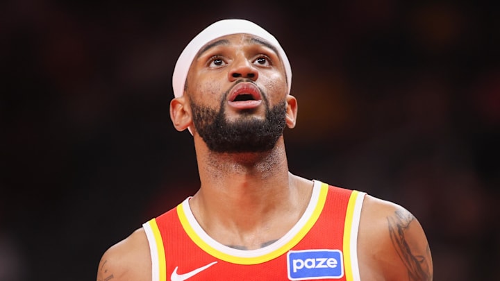 Nickeil Alexander-Walker (7) looks to rebound a ball against the Milwaukee Bucks in the first quarter at State Farm Arena.