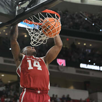 Mar 21, 2025; Raleigh, NC, USA;  Oklahoma Sooners forward Jalon Moore (14) makes a basket during the second half against the Connecticut Huskies at Lenovo Center.