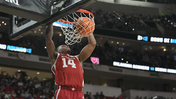 Oklahoma Sooners forward Jalon Moore (14)