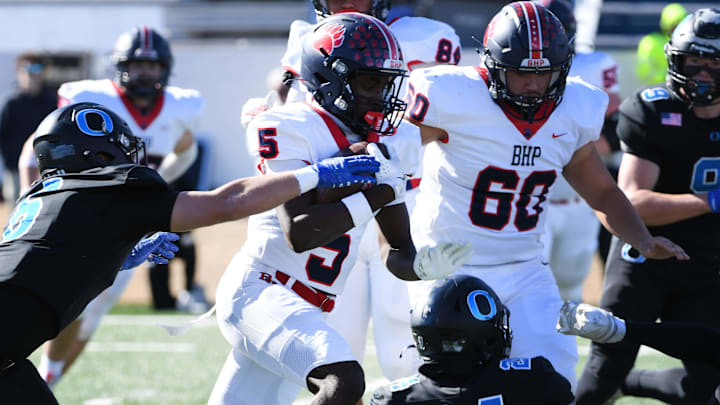 Belton-Honea Path High sophomore Tajeh Watson-Martin (5) run with the ball after making a catch against Oceanside Collegiate Academy in the Class AAA state championship game.