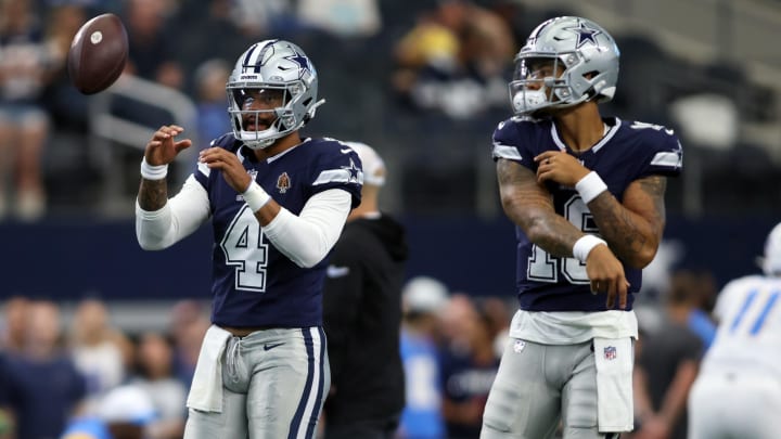 Dallas Cowboys quarterback Dak Prescott (4) and  quarterback Trey Lance (19) 