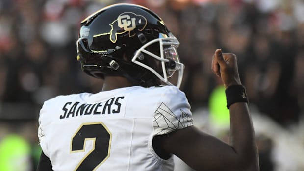 Colorado's Shedeur Sanders gestures after a touchdown against Texas Tech in a Big 12 football game Saturday, Nov. 9, 2024, at