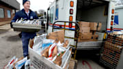 Letter Carrier Steve Homa loads up his mail truck