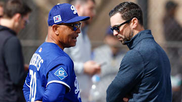 Los Angeles Dodgers manager Dave Roberts and general manager Brandon Gomes.