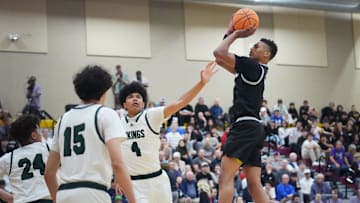 Millennium Tigers guard Cameron Holmes (3) shoots the ball over Sunnyslope Vikings forward Cristian Simmons (4) during their Open Division boys basketball state semifinals game at Chaparral High School in Phoenix on March 5, 2025.