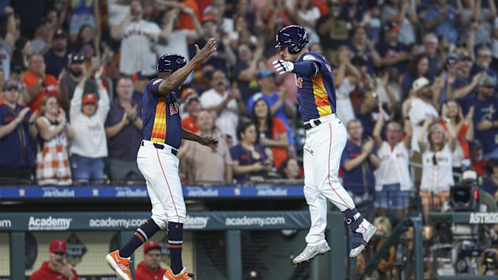 Sep 22, 2024; Houston, Texas, USA; Houston Astros third baseman Alex Bregman (2) celebrates with third base coach Gary Pettis (8) after hitting a home run during the fifth inning against the Los Angeles Angels at Minute Maid Park. Mandatory Credit: Troy Taormina-Imagn Images Sep 22, 2024; Houston, Texas, USA; Houston Astros third baseman Alex Bregman (2) celebrates with third base coach Gary Pettis (8) after hitting a home run during the fifth inning against the Los Angeles Angels at Minute Maid Park. Mandatory Credit: Troy Taormina-Imagn Images
