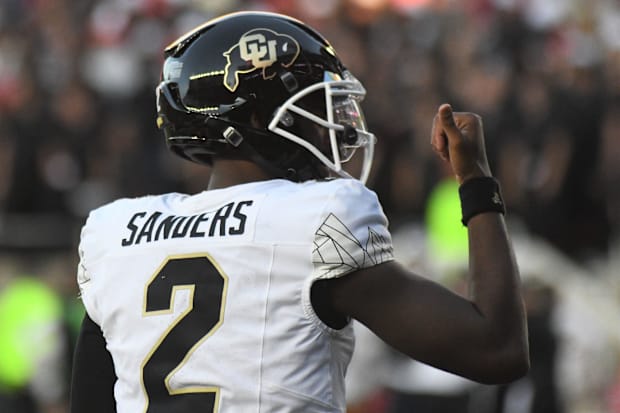 Colorado's Shedeur Sanders gestures after a touchdown against Texas Tech.