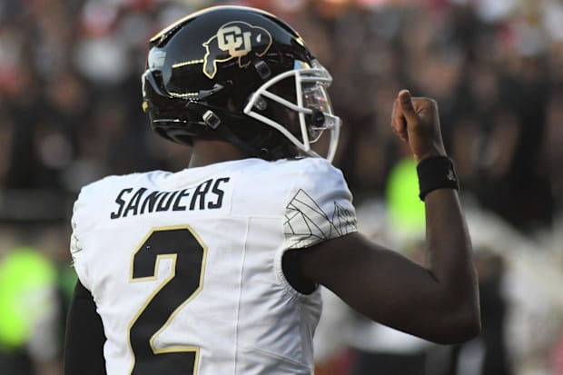 Colorado's Shedeur Sanders gestures after a touchdown against Texas Tech in a Big 12 football game Saturday, Nov. 9, 2024, at