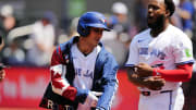 Jul 28, 2024; Toronto, Ontario, CAN; Toronto Blue Jays left fielder Daulton Varsho (25) wears the home run jacket after his two run home run against the Texas Rangers  during the first inning at Rogers Centre.