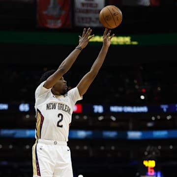 Jan 5, 2025; Washington, District of Columbia, USA; New Orleans Pelicans forward Herbert Jones (2) shoots the ball over Washington Wizards forward Corey Kispert (24) in the third quarter at Capital One Arena. Mandatory Credit: Geoff Burke-Imagn Images