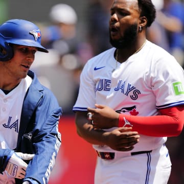 Jul 28, 2024; Toronto, Ontario, CAN; Toronto Blue Jays left fielder Daulton Varsho (25) wears the home run jacket after his two run home run against the Texas Rangers  during the first inning at Rogers Centre.