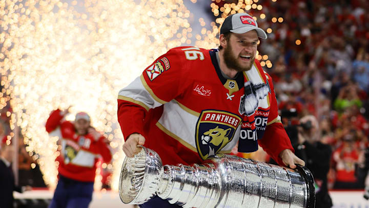 Florida Panthers star Aleksander Barkov skates with the Stanley Cup trophy.