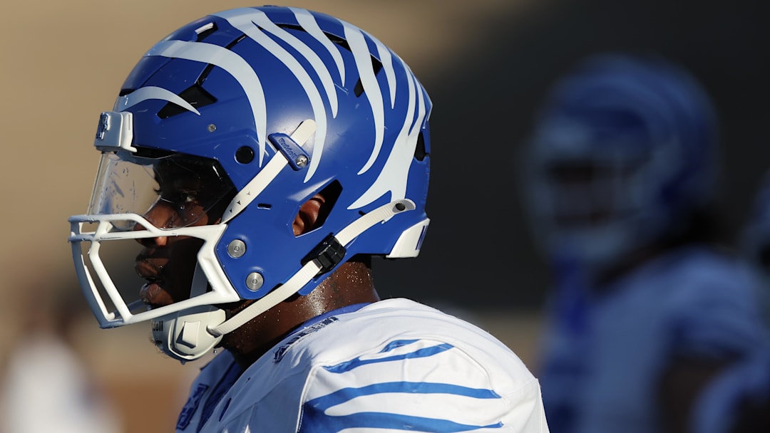 Memphis Tigers linebacker Everett Roussaw Jr. (6) warms up before playing against the Rice Owls at Rice Stadium.