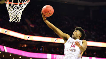Senior guard Terrance Mann lays one up during the first half of the ACC Tournament Quarterfinal Game at the Spectrum Center in Charlotte on Thursday.

20190314 Dsc 1243