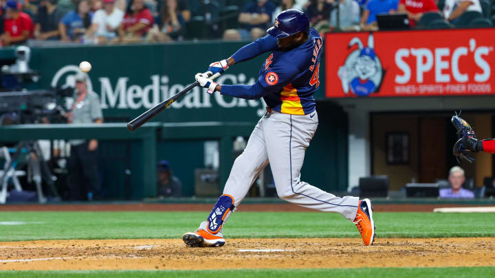 Aug 6, 2024; Arlington, Texas, USA; Houston Astros left fielder Yordan Alvarez (44) hits a two-run home run during the ninth inning against the Texas Rangers at Globe Life Field. Mandatory Credit: Kevin Jairaj-USA TODAY Sports