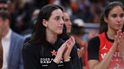 Team Clark guard Caitlin Clark, who's still recovering from a groin injury, reacts after the WNBA All Star Game at Gainbridge Fieldhouse.