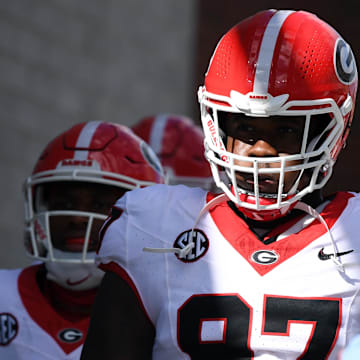 Oct 14, 2023; Nashville, Tennessee, USA; Georgia Bulldogs defensive lineman Warren Brinson (97) walks to the field before the game against the Vanderbilt Commodores at FirstBank Stadium. Mandatory Credit: Christopher Hanewinckel-Imagn Images