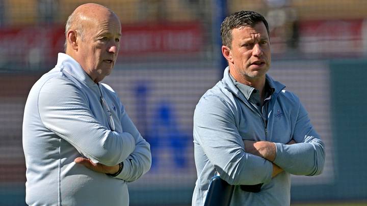 Apr 28, 2026; Los Angeles, California, USA; Los Angeles Dodgers President and CEO Stan Kasten talks with Andrew Friedman, President of Baseball Operations, prior to the game against the Miami Marlins at Dodger Stadium. Mandatory Credit: Jayne Kamin-Oncea-Imagn Images