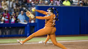 Jun 5, 2025; Oklahoma City, OK, USA;  Texas Longhorns pitcher Citlaly Gutierrez (77) throws a pitch in the sixth inning against the Texas Tech Red Raiders during game two of the NCAA Softball Women's College World Series finals at Devon Park. Mandatory Credit: Brett Rojo-Imagn Images