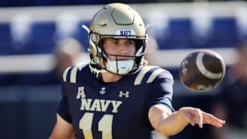 Oct 19, 2024; Annapolis, Maryland, USA; Navy Midshipmen quarterback Blake Horvath (11) pitches the ball before a game against the Charlotte 49ers at Navy-Marine Corps Memorial Stadium. Mandatory Credit: Daniel Kucin Jr.-Imagn Images