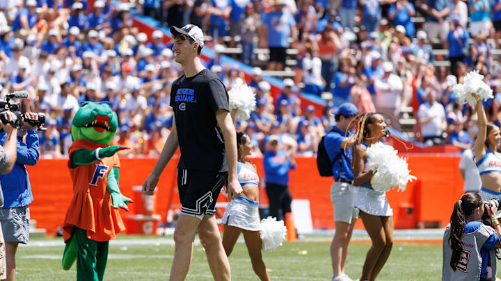 Apr 12, 2025; Gainesville, FL, USA; Florida Gators center Olivier Rioux (32) walks on the field during the National Championship celebration at Ben Hill Griffin Stadium. Mandatory Credit: Matt Pendleton-Imagn Images