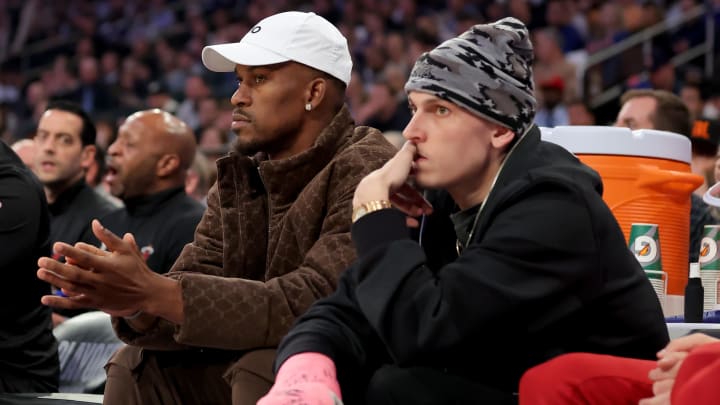 May 2, 2023; New York, New York, USA; Miami Heat injured forward Jimmy Butler (22) and injured guard Tyler Herro (14) watch from the bench during the first quarter of game two of the 2023 NBA Eastern Conference semifinal playoffs against the New York Knicks at Madison Square Garden. Mandatory Credit: Brad Penner-USA TODAY Sports