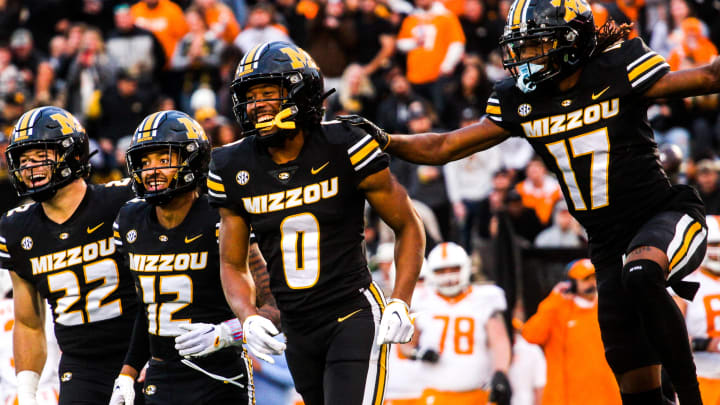 From left, Missouri's Will Norris, Drey Norwood, Joshua Manning and Marquis Johnson celebrate after a play during a college football game at Faurot Field on Nov. 11, 2023, in Columbia, Mo.