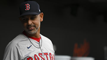 Boston Red Sox manager Alex Cora (13) stands in the dugout during the first inning of the game against the Baltimore Orioles at Oriole Park at Camden Yards.