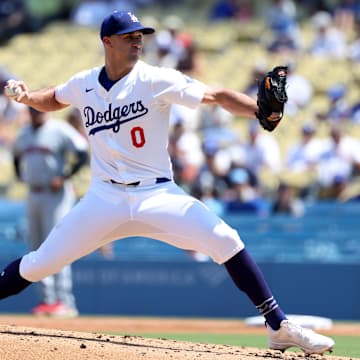 Sep 8, 2024; Los Angeles, California, USA;  Los Angeles Dodgers starting pitcher Jack Flaherty (0) pitches during the second inning against the Cleveland Guardians at Dodger Stadium. Mandatory Credit: Kiyoshi Mio-Imagn Images